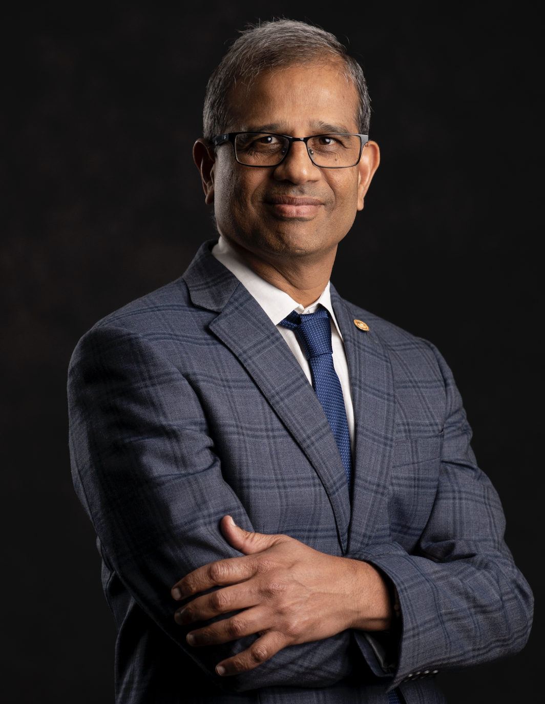 Dr. Bhimu Patil (USA)